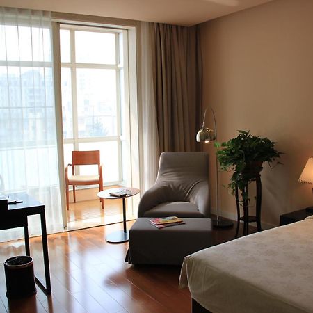 Green Park Hotel Tianjin Binhai  Номер фото